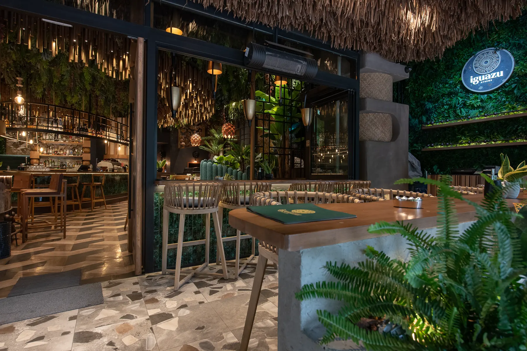 Bar stools and the tiled floor at Iguazu Athens, Brazil Square