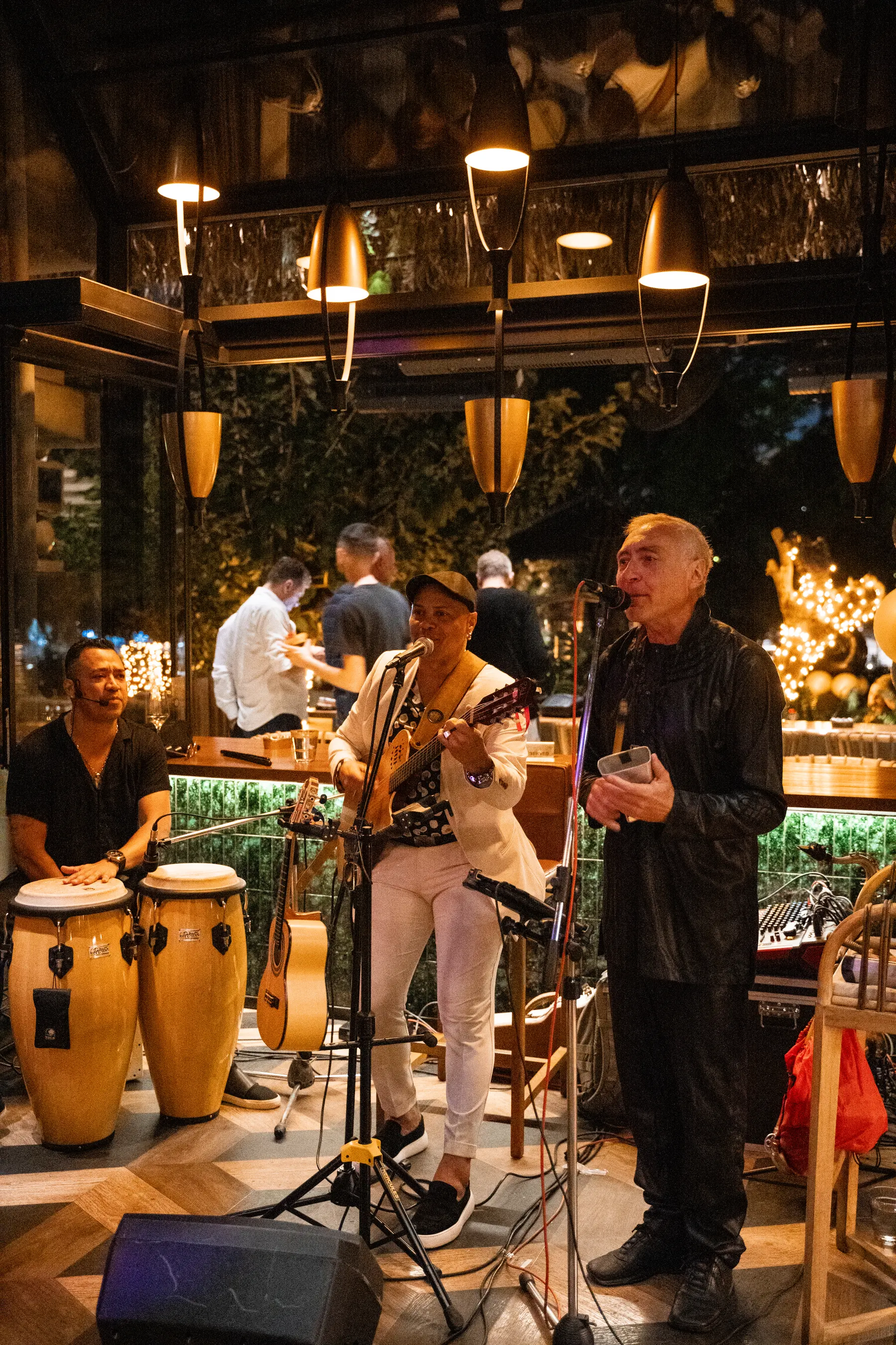 The band playing congas at a birthday party at Iguazu Athens