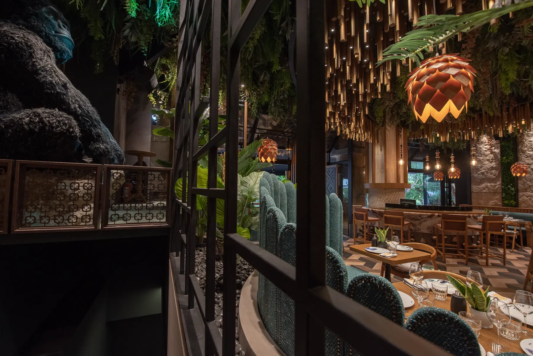 The giant gorilla figure watching over the dining room from the mezzanine at Iguazu Athens