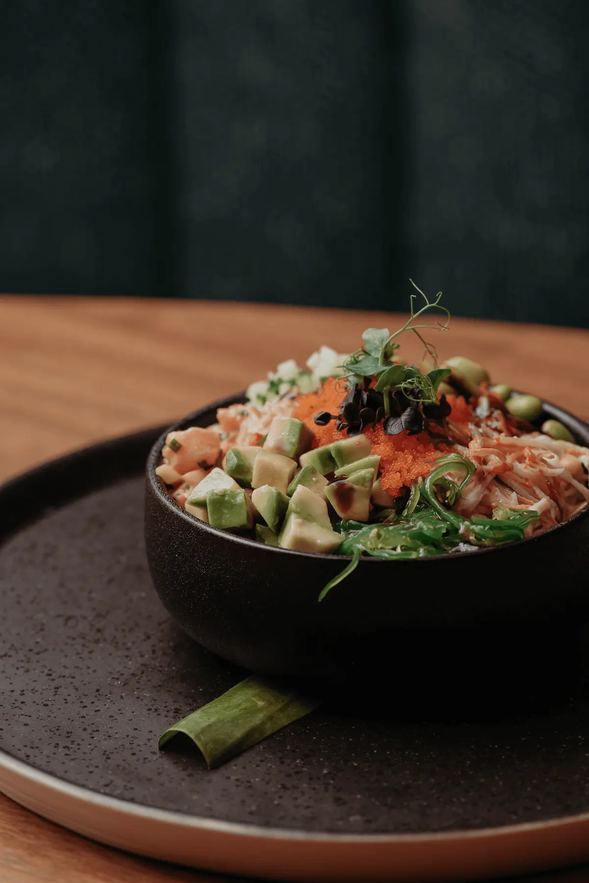 A poke bowl with avocado, edamame and roe at Iguazu Athens