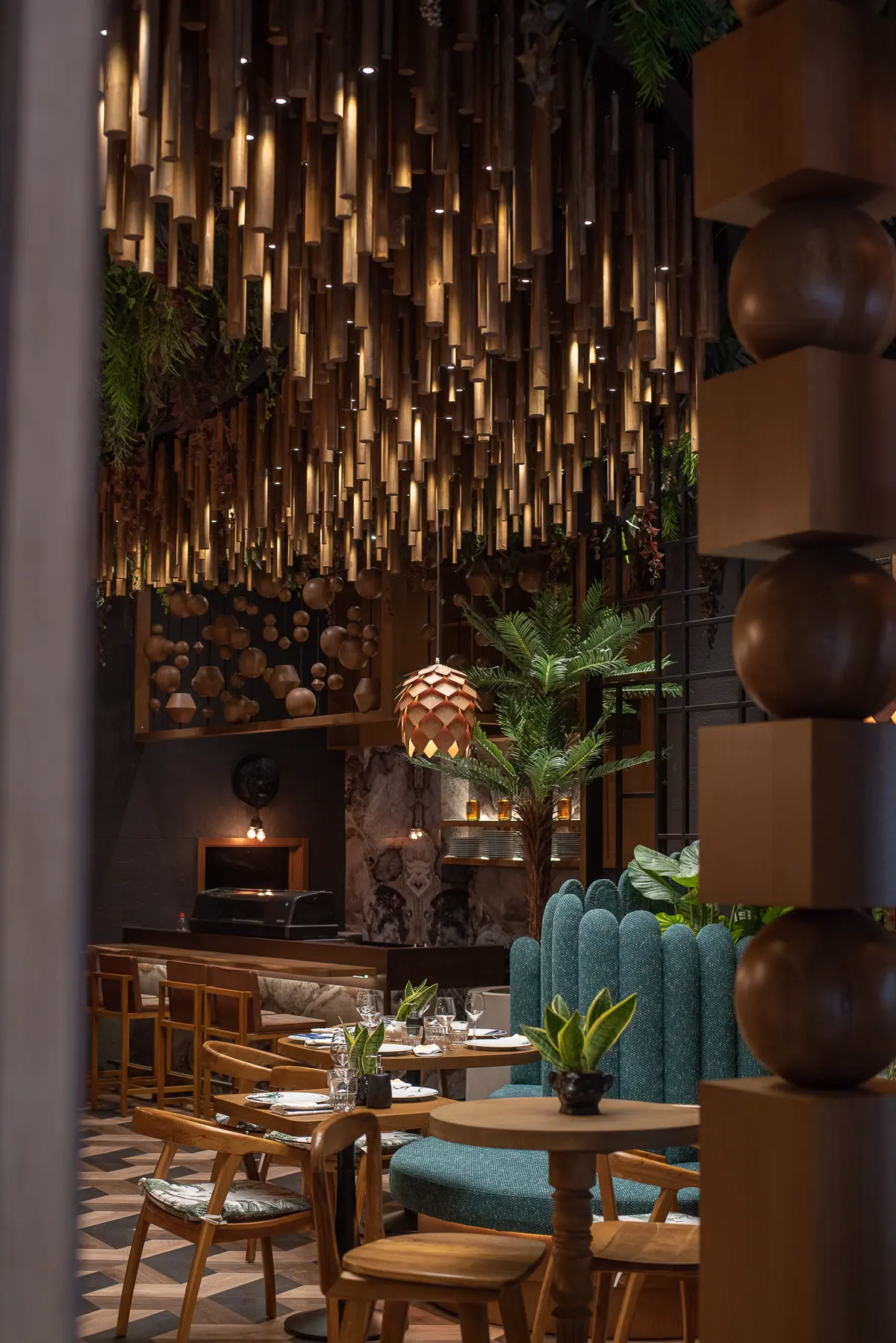 A quiet corner table beside the fire at Iguazu Athens