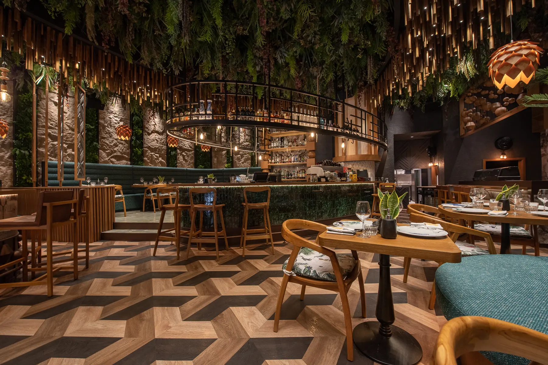 The herringbone floor and curved bar at Iguazu Athens