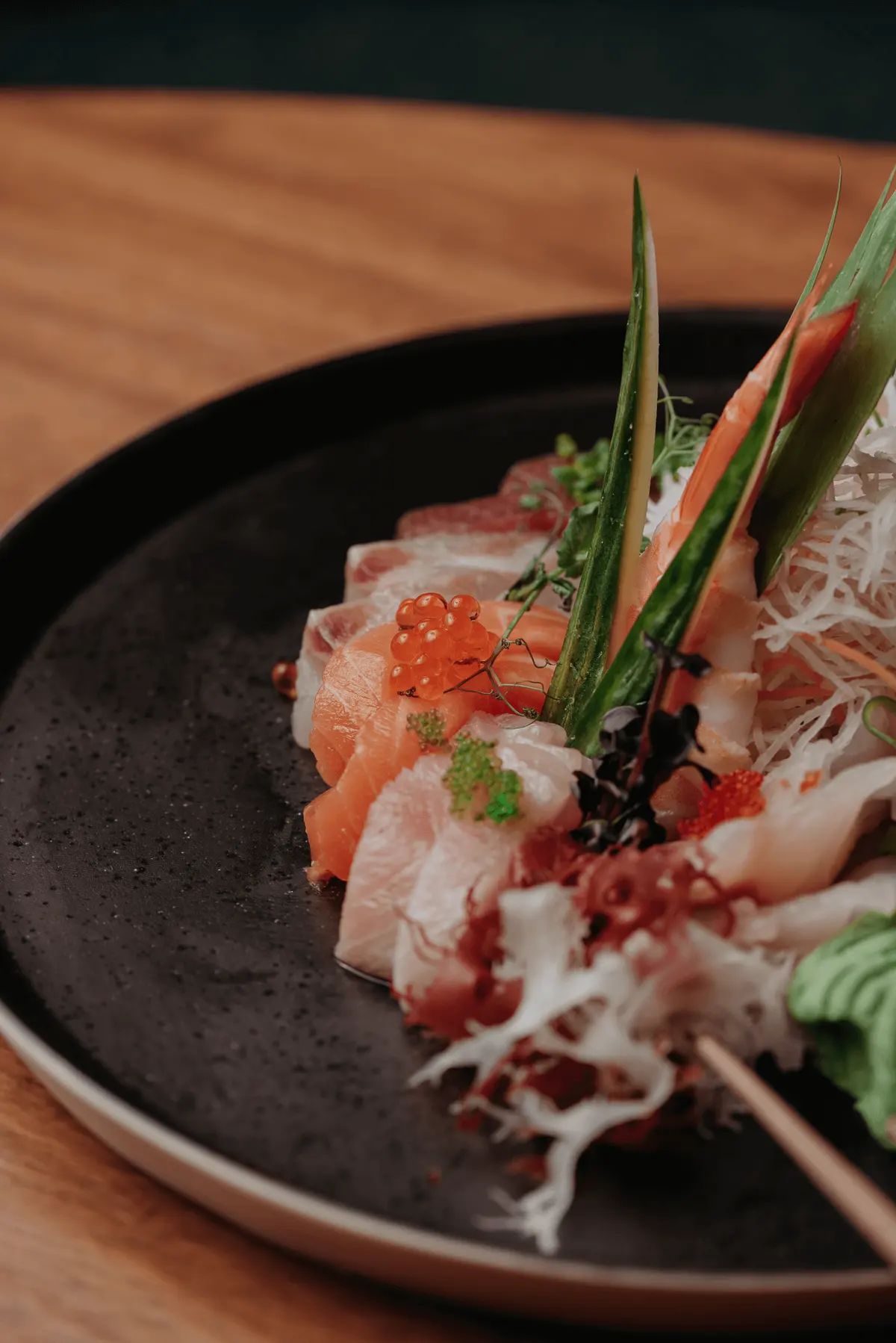 The signature sashimi selection with salmon, tuna and roe at Iguazu Athens